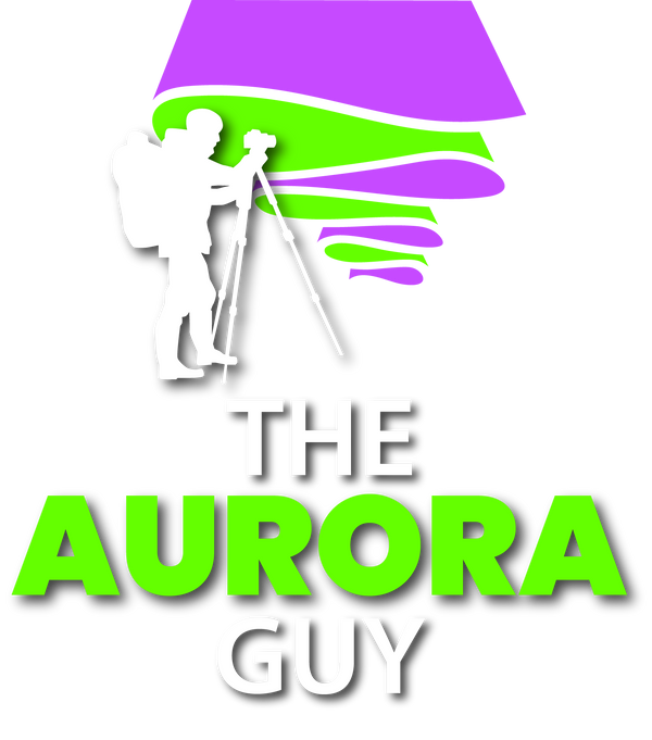 Vincent Ledvina - The Aurora Guy Logo - man holding tripod and camera photographing aurora